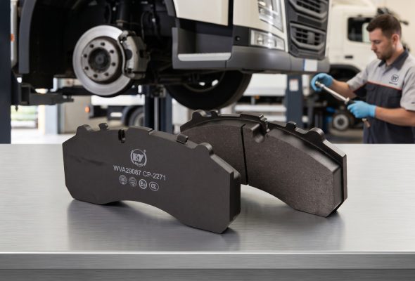 Truck brake pads that wear out fast compared to a durable set - BAIYUN commercial vehicle pads on a service bench